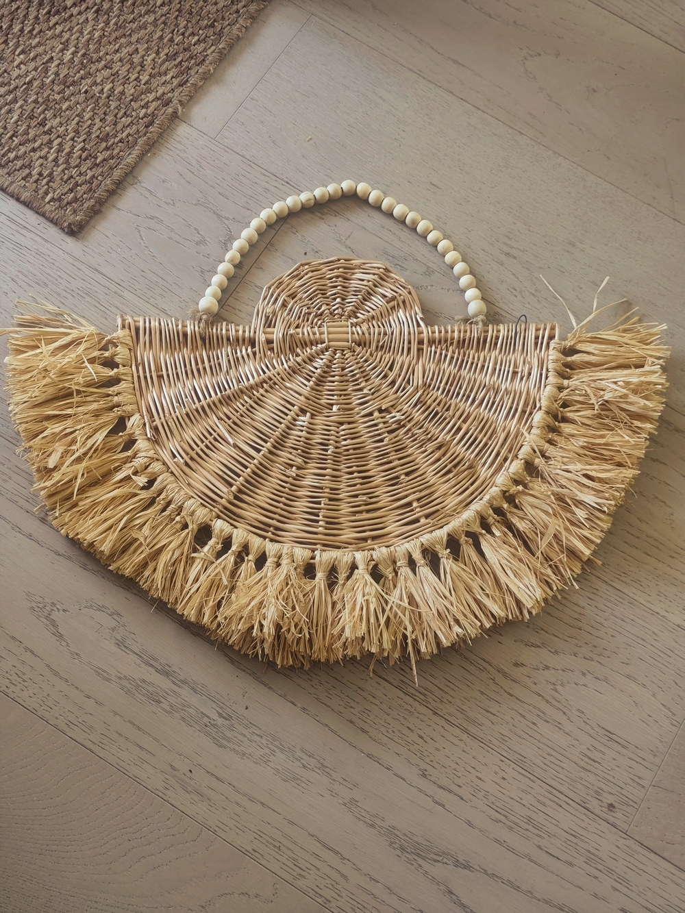 Woven Rattan Fringe Half-Moon Handbag in Natural